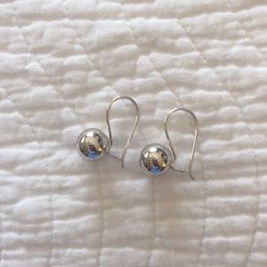 Hanging silver ball earrings